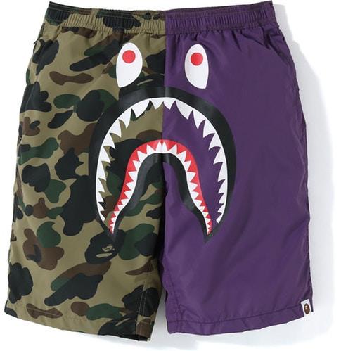 BAPE - HALF 1ST CAMO SHARK BEACH SHORT (PURPLE/GREEN) - PUR1_e10d11be-a91a-40c6-b348-0937c558e149